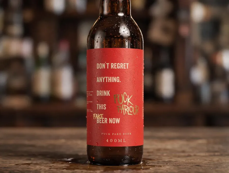 FK Parlour beer bottle with a red label, close up
