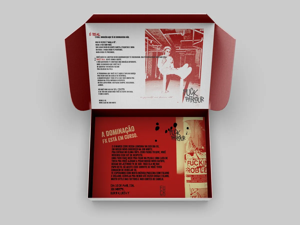 Open FK Parlour box revealing the opening invitation